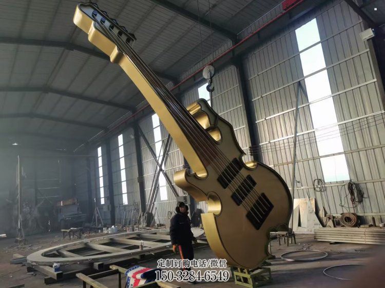 大提琴雕塑定做,小区摆件,不锈钢大提琴雕塑制作 大提琴雕塑定做,小区摆件,不锈钢大提琴雕塑制作